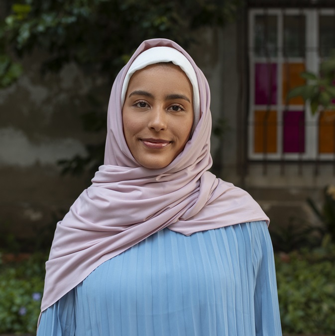 front view woman wearing halal outdoors